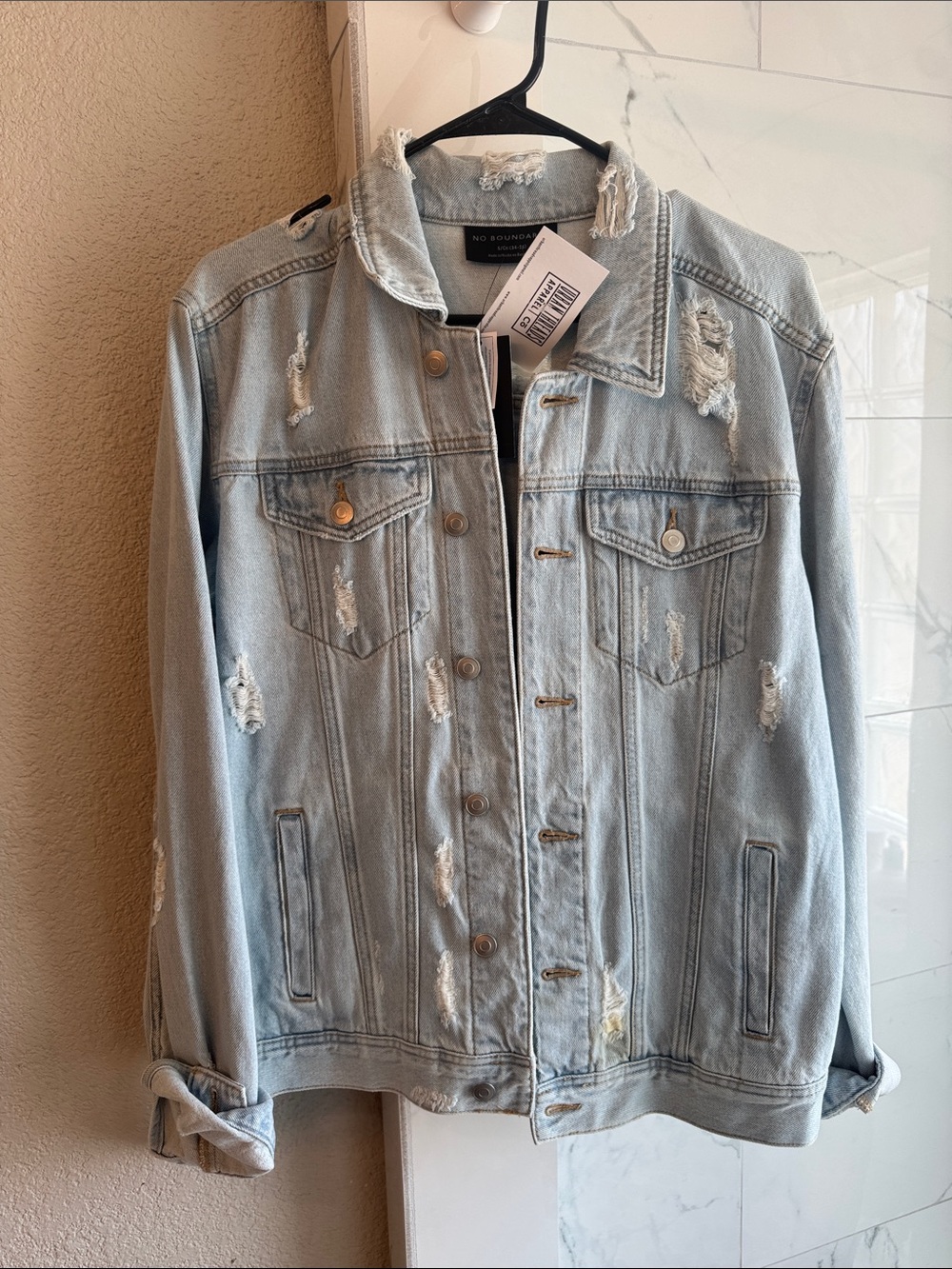 Light Blue Distressed Denim Jacket with Yellow Smile Patch